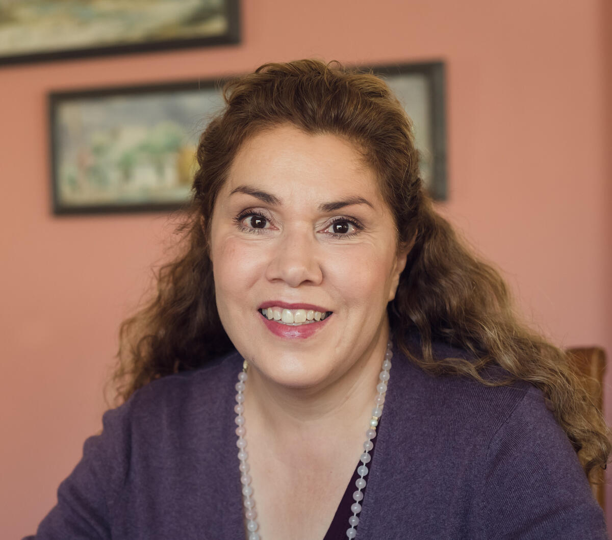 headshot of professor Lorena Oropeza smiling at camera