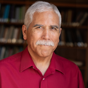 headshot of professor Marcial González smiling at camera